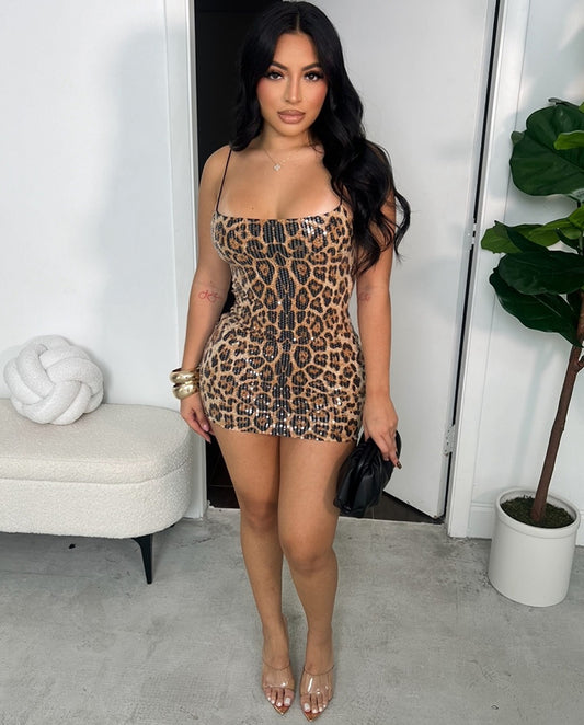 LADIES LEOPARD PRINT MINI DRESS                            BLACK LEOPARD / BROWN LEOPARD                               (SIZE  S - 2XL)